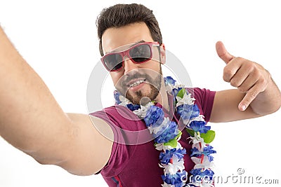 Selfie. POV. Man enjoys the Carnival. Party. Beautiful and beard Stock Photo