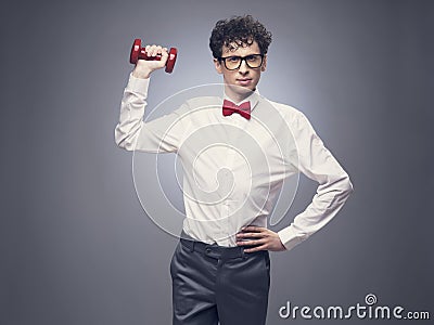 Funny man lifting weights Stock Photo