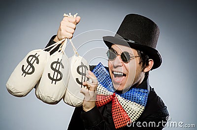 The funny man with money dollar sacks Stock Photo