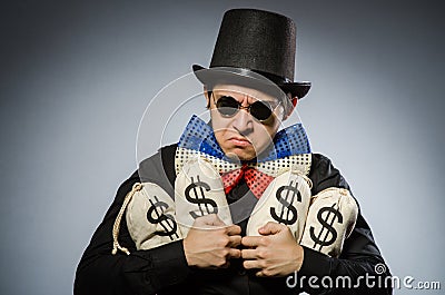 The funny man with money dollar sacks Stock Photo