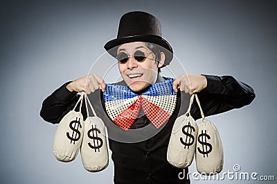 The funny man with money dollar sacks Stock Photo