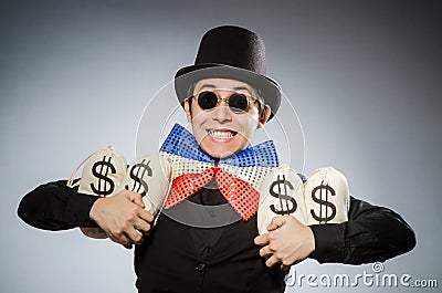 Funny man with money dollar sacks Stock Photo