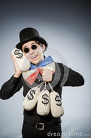 Funny man with money dollar sacks Stock Photo