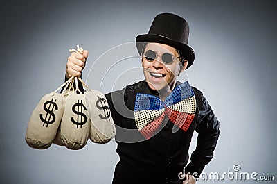 Funny man with money dollar sacks Stock Photo