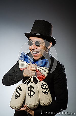 Funny man with money dollar sacks Stock Photo