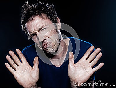 Funny Man Portrait frowning refusal Stock Photo