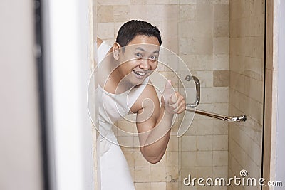 Funny Man Smiling in Bathroom Stock Photo
