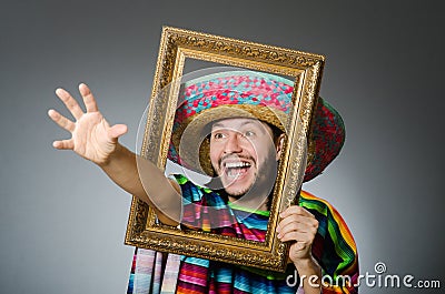 The funny man with sombrero and picture frame Stock Photo