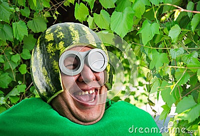 Funny man with watermelon helmet and googles Stock Photo