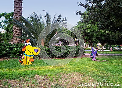 Funny metal dogs on the lawn Editorial Stock Photo