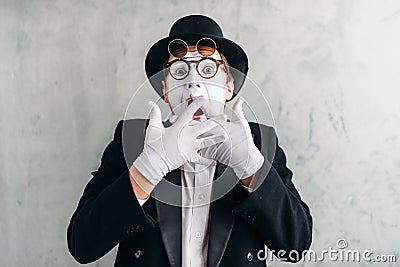 Funny mime actor with makeup mask Stock Photo