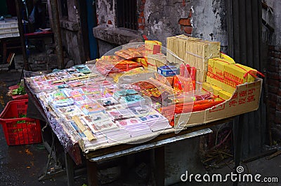 Fake money for sale to be placed as offerings at graves, Yichang China Editorial Stock Photo