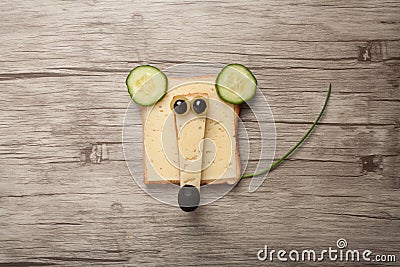 Funny mouse made of bread and cheese Stock Photo