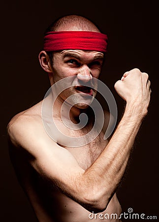 Funny nerd showing his biceps Stock Photo