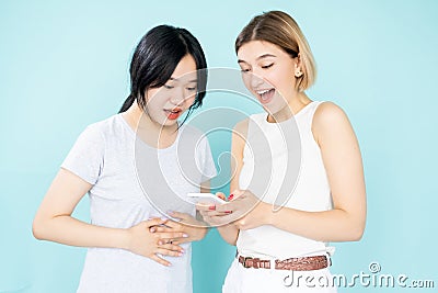 funny news happy women mobile communication Stock Photo