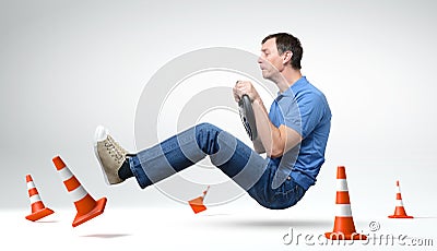 Funny novice man car driver with a wheel Stock Photo