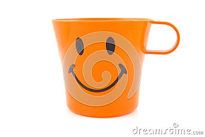 Funny orange drinking cup Stock Photo