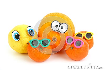 Funny orange, lemon and mandarins Stock Photo