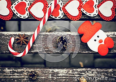 Funny outdoor Christmas composition with pine cones, lollipop Stock Photo