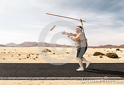 Funny overweight man chasing the hot dog Stock Photo