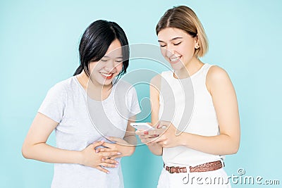 funny photos excited female friends keep moments Stock Photo