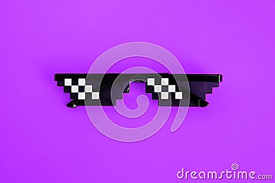 Funny pixelated boss sunglasses on purple background. Gangster, Black thug life meme glasses . Pixel 8bit style Stock Photo