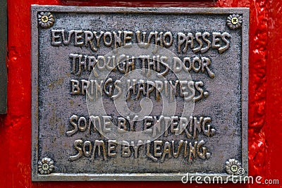 Funny Plaque on The Temple Bar Public House in Dublin Editorial Stock Photo