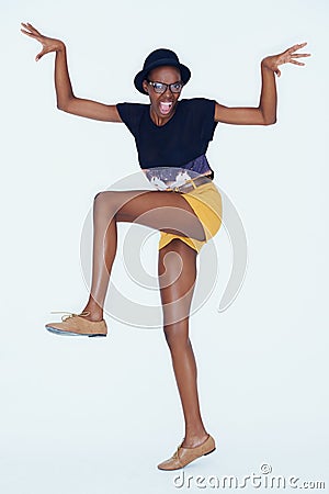 Funny, portrait and black woman with fashion, goofy and cheerful girl on white studio background. African person Stock Photo