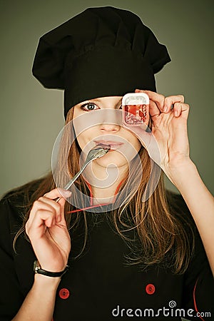 Funny portrait of a joyful lady cook Stock Photo