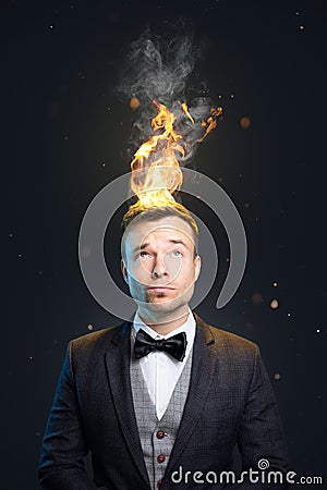 Funny portrait of a man with burning hair Stock Photo