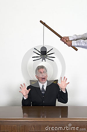 Funny Practical Joke in a Business Office on a Worker Stock Photo