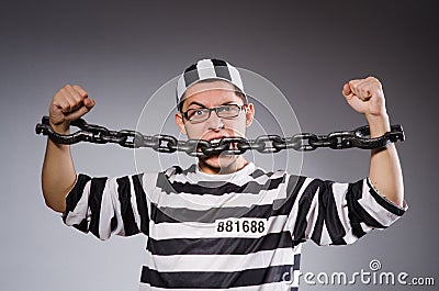 Funny prisoner in chains Stock Photo