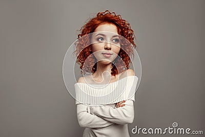 Funny red curly girl with big head and funny hairstyle. Caricature stylization of female logic Stock Photo