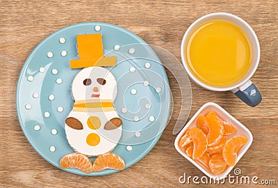 Funny sandwich for kids in a shape of a snowman Stock Photo