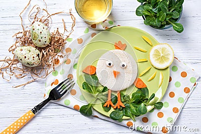 Funny sandwich in a shape of chick, food for kids Easter idea, top view Stock Photo