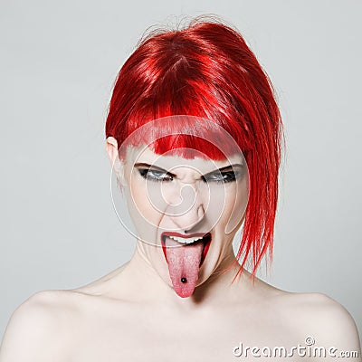 Funny & expressive redhead girl Stock Photo