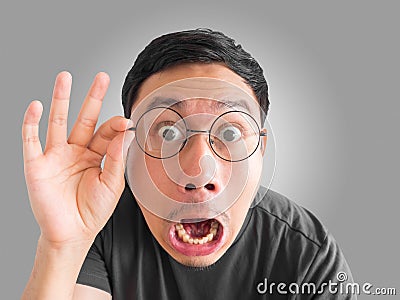 Funny shocked and surprised face of man. Stock Photo