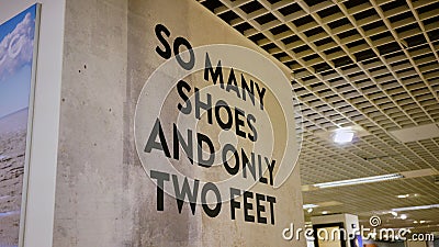 Funny sign in Shoe Department in Germany Editorial Stock Photo