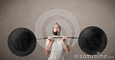 Funny skinny guy lifting weights Stock Photo