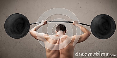 Funny skinny guy lifting weights Stock Photo