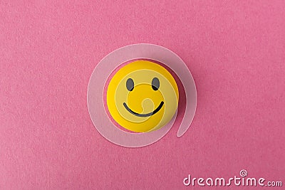 Funny smiley face on pink background. Positive mood. Empty text space Editorial Stock Photo