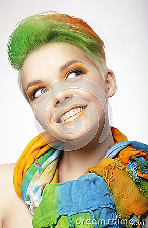 Funny Smiling Woman with Colored Hairs Looking Up Stock Photo