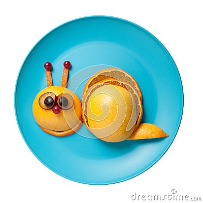 Funny snail made of fruits Stock Photo