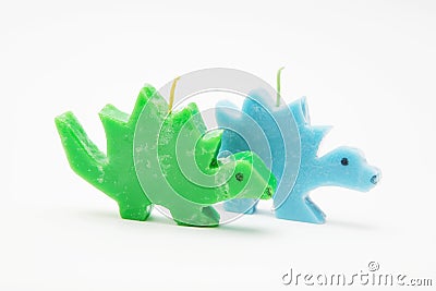 Funny Souvenir gift candles in the shape of multicolored dragons Stock Photo