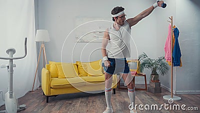 funny sportsman in eyeglasses exercising with Stock Photo