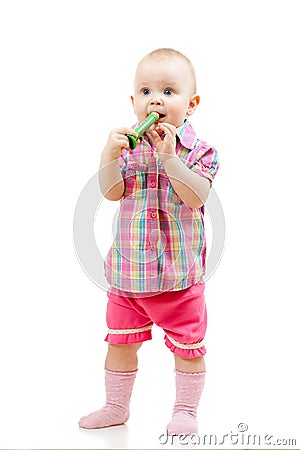 Funny standing baby with musical toy Stock Photo