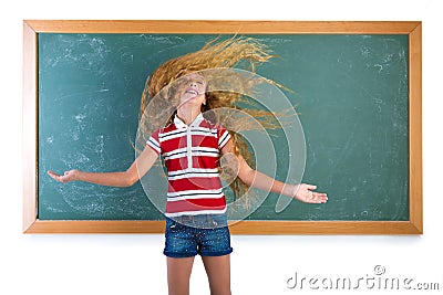 Funny student girl flipping long hair at school Stock Photo