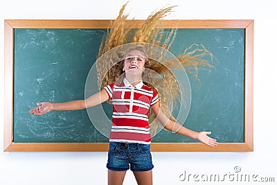 Funny student girl flipping long hair at school Stock Photo