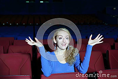 Funny and surprised woman watches movie Stock Photo