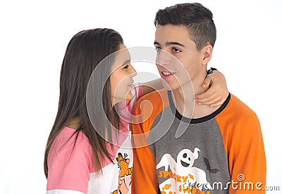 Funny teen couple, smiling newly wake up and dressed in their p Stock Photo